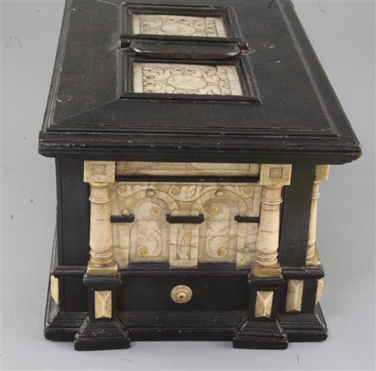 A 17th century Malines alabaster mounted ebonised casket, height 8.25in. with handle up 13.75in.